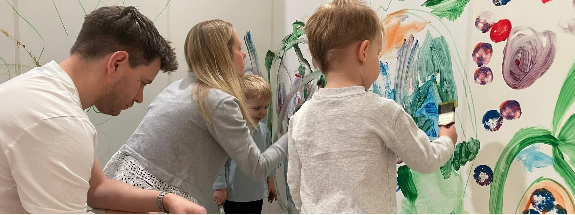 Dad and daughter painting
