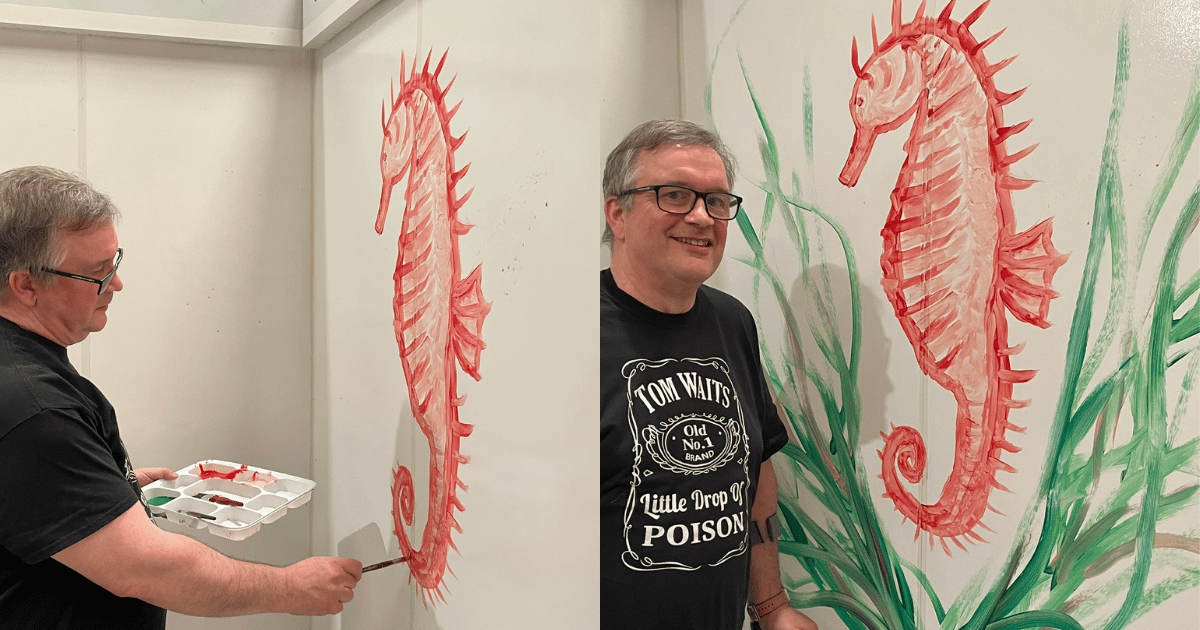Man proud of his sea horse at Paint and Go