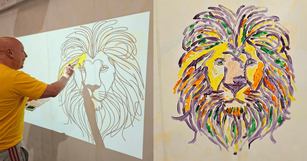 Man using the projector at Paint and Go