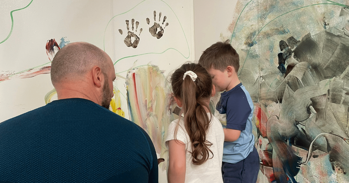 Toddler Paint Dad with his two children