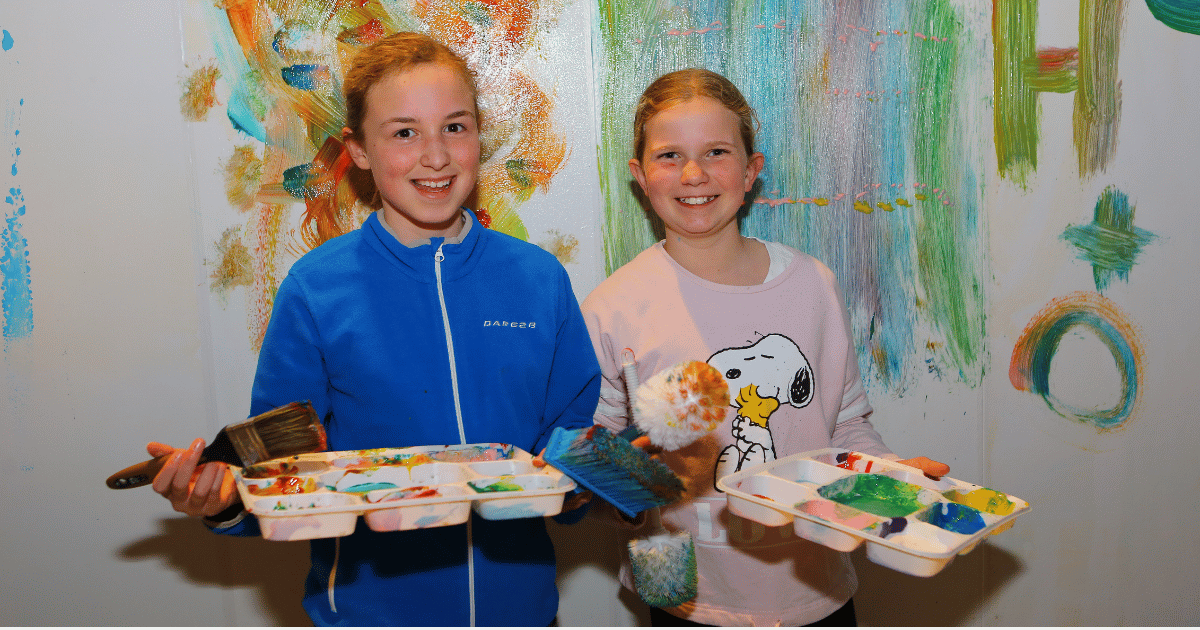 Two Girls Enjoying themselves at Teen Neon Paint Night