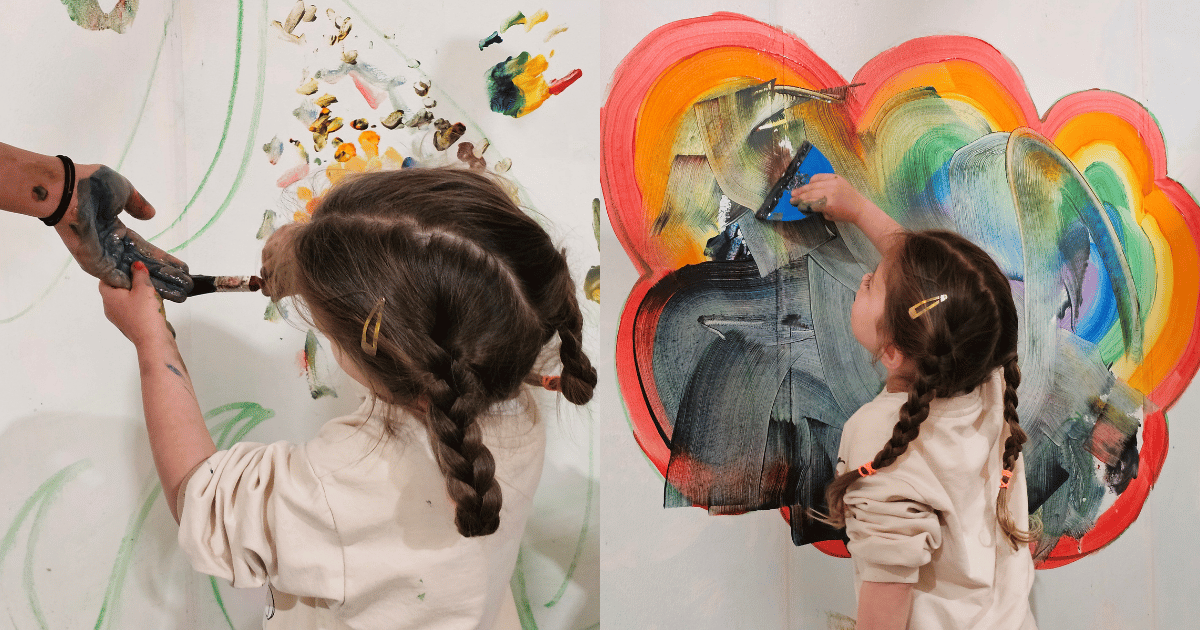 Young Girl painting her mums hand at Paint and Go Tunbridge Wells